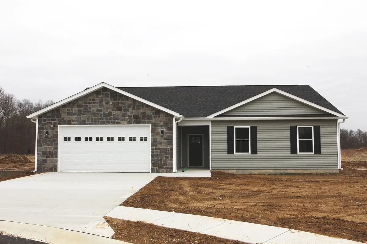 The Spruce, a completed Four Oaks home in Spencer, Indiana, seen from the front.